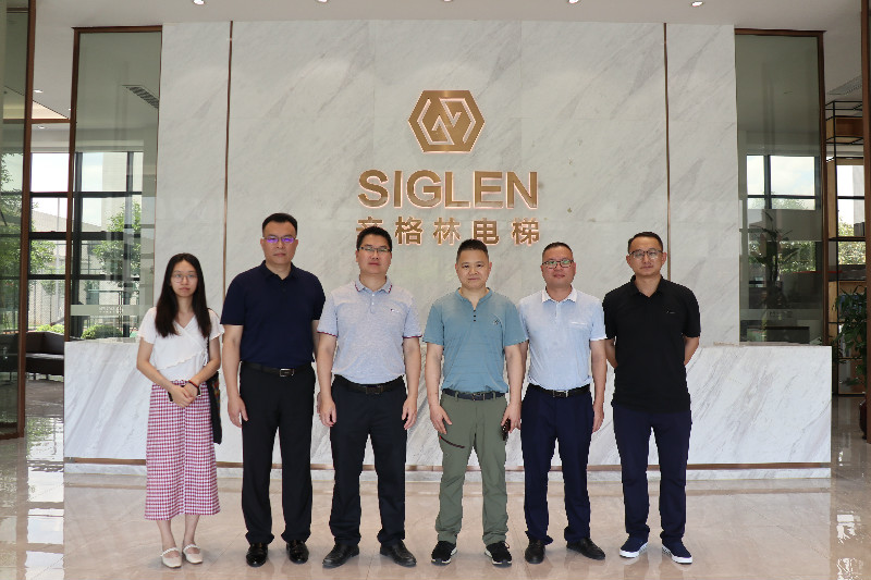 熱烈歡迎信宜市副市長率團(tuán)隊蒞臨辛格林電梯考察指導(dǎo)！